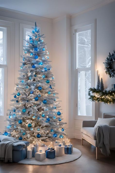 Light blue and white Christmas tree White Christmas Tree Blue Lights, Icy Blue Christmas Tree, Christmas Tree With Blue Lights, Light Blue Christmas Tree, Blue And White Christmas Tree, Blue Christmas Lights, Blue And White Christmas, White Christmas Tree Decorations, Christmas Tress