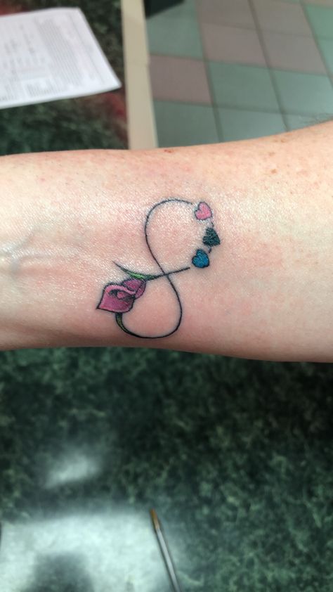 Infinity Tattoo With Lily, Small Infinity Tattoos With Initials, Infinity Sign With Initials Tattoo, Infinity Tattoo With Kids Names On Wrist, Heart Tattoo With Infinity Sign, Dahlia Tattoo, Stargazer Lily, Infinity Heart, Calla Lily