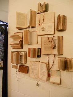 Calling all bookworm crafters - what's your favorite way to repurpose old books into wall/home décor?I have a brand new, empty room to slap pretty things all over, and would love your suggestions, guides, and examples - I put the kinds of things I'm looking to do below.Thanks guys! I really like the idea of strung up pages, folded in to shapes like above, or maybe just cut-outs? I love the  look of this.  What's the best way to keep the books on the walls, or not have the… Jewelry Wall Display, Upcycled Furniture Before And After, Steampunk Home Decor, Diy Home Decor For Apartments, Steampunk House, Upcycled Furniture Diy, Jewelry Wall, Deco Nature, Folded Book Art