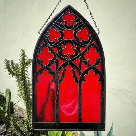 HANDMADE STAINED GLASS PANEL: GOTHIC CATHEDRAL ARCH Made in Long Beach, CA (with love). Original design created by myself. 111 pieces. Two shades of red. The panel is formed using copper foil and solder, and a black hanging chain is included.  All glass is different, and no sheet is perfect. Please be mindful that there may be bubbles/streaks/etc. Also note that these items are handmade, so there may be minor imperfections. Glass is very fragile, so always handle your glass with extreme care, using two hands, and always hang from a very secure point (I advise strongly against suction cups). Although your glass piece is sealed with wax, note that it does contain lead. It is highly recommended to wash your hands thoroughly with soap and water after handling your glass. **INTERNATIONAL BUYERS Stained Glass Arch Window, Goth Stained Glass Windows, Spooky Stained Glass Art, Gothic Stained Glass Patterns, Gothic Stained Glass Windows Art, Art Deco Stained Glass Patterns, Geometric Stained Glass Patterns, Gothic Stained Glass Windows, Goth Window