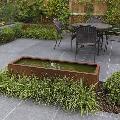 Simple Water Features In The Garden, Corten Steel Water Feature, Bubbling Fountain, Grey Paving, Modern Water Feature, Container Water Gardens, Garden Water Feature, Small Water Features, Back Garden Design