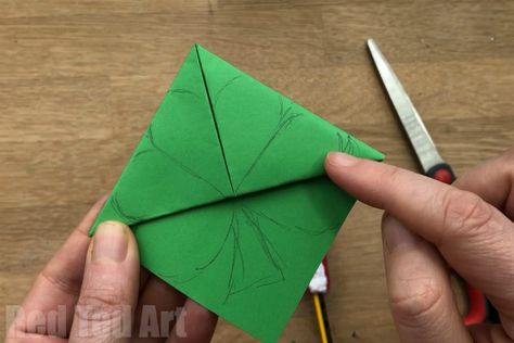 Easy Shamrock Corner Bookmark Design for St Patrick's Day. We ove a fun Corner Bookmark Design. Today's lucky Shamrock Bookmarks are quick and easy to make. A great little gift for some on St Patrick;s Day!! Add the cute Kawaii Shamrock faces or leave plain! #Shamrock #Shamrockcraft #stpatricksday #cornerbookmark #bookmark Origami Shamrock How To Make, St Patricks Day Art, Saint Patricks Day Art, Leaf Bookmark, Bookmark Design, Teacher Projects, Red Ted Art, St. Patrick's Day Crafts, Origami Bookmark