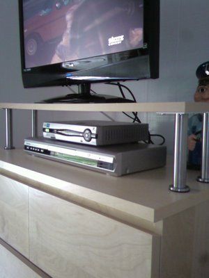 An easy to DIY TV stand - IKEA Hackers Tv Riser, Remodel Furniture, Hackers Ikea, Ladder Shelf Diy, Lack Shelf, Kid Bedrooms, Swivel Tv Stand, Diy Wood Shelves, Dresser With Tv