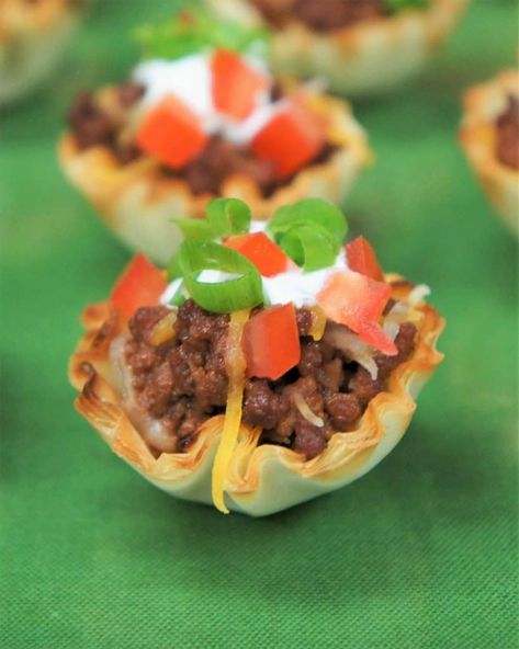 These little taco cups make a great appetizer and they’re really easy to make too. These flaky and delicious fillo cups are filled with flavorful taco meat, then baked and topped with cheddar jack cheese. #tacocups #appetizers Philo Cups Appetizers Appetizer Recipes, Philo Cups, Mini Taco Appetizer, Taco Appetizers, 4th Of July Fun, New Year's Snacks, Dessert Nachos, Taco Cups, Phyllo Cups