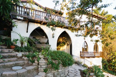 Arched windows and exposed beams abound Spanish Gothic, Turret House, Spanish Exterior, Spanish Revival Home, Mediterranean Home Decor, Spanish Style Home, Hacienda Style, Spanish Tile, Spanish Revival