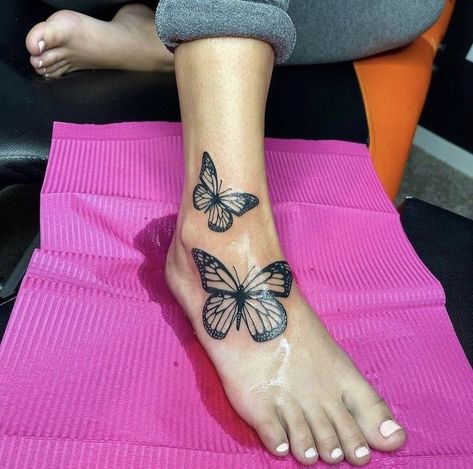 Butterflies On Feet Tattoo, Feet Butterfly Tattoo, Feet Tattoos For Women Butterfly, Ankle Tattoo Butterflies, Blue Tattoos For Women Brown Skin, Ankle Tattoo Black Women, Foot Tattoo Black Women, Foot And Ankle Tattoos For Women, Butterfly Tattoo Foot