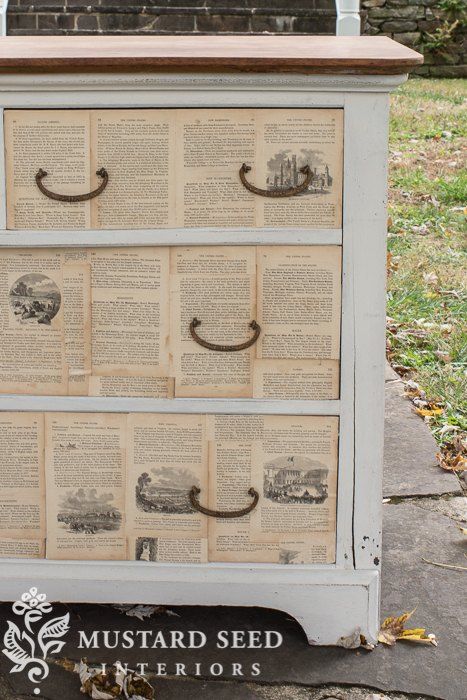 This is a great way to freshen an old piece of furniture. To freshen up our old dresser we used an old book, but any kind of paper would work, so pick one that works with your decor. Really excited to share how I went about making this so let's get right to it! Materials: Matte Mod Podge, Scissors, Parsons West 2 1/2" sash brush, Nail for puncturing holes for hardware, Dresser was painted in Miss Mustard Seed's Milk Paint in Marzipan First step: Each dresser has drawers… Decoupage Dresser Ideas, Decoupage Dresser Drawers, Computer Cupboard, Decoupage Dresser, Diy Wall Sconces, Diy Beadboard, Beadboard Kitchen, Upcycled Decor, Nursery Book