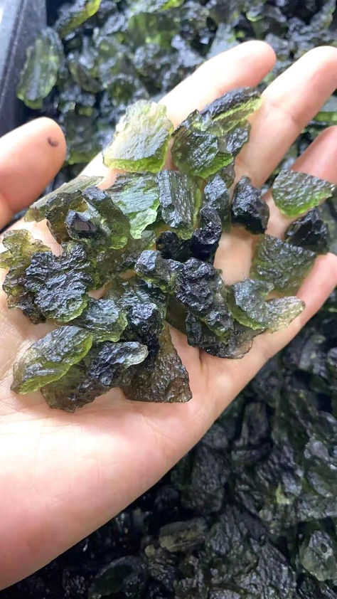 Discover the power of authentic Moldavite! Each unique piece, ranging from delicate chips to substantial chunks, is sold by weight in grams. Request an authenticity certificate in your order notes for peace of mind. Moldavite's enchanting green hues will not only protect but also mesmerize. Don't miss out - follow us for more crystal treasures! #MoldaviteMagic #CrystalProtection Moldavite Aesthetic, Moldivate Crystal, High Geologist, Crystal Moldavite, Magic Lightning, Moldavite Crystal, Green Aventurine Necklace, Fossil Bones, Aventurine Necklace