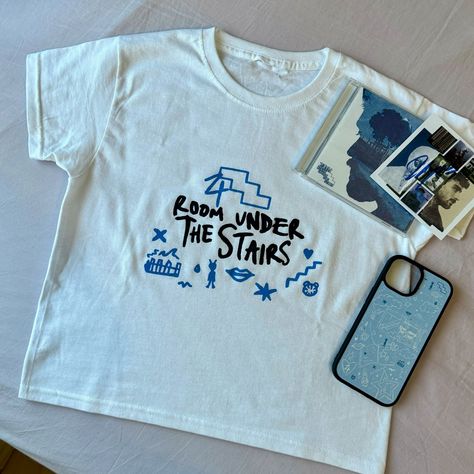 room under the stairs shirt and phone case available on the shop now!! #zayn #zaynmalik #roomunderthestairs #ruts #onedirection #explorepage #smallbusiness #smallbusinessowner #fanmerch Zayn Merch, Room Under The Stairs, One Direction Gifts, One Direction Merch, Under The Stairs, Patchwork Clothes, Shirt Pins, Tour Shirt, Unisex Shirts