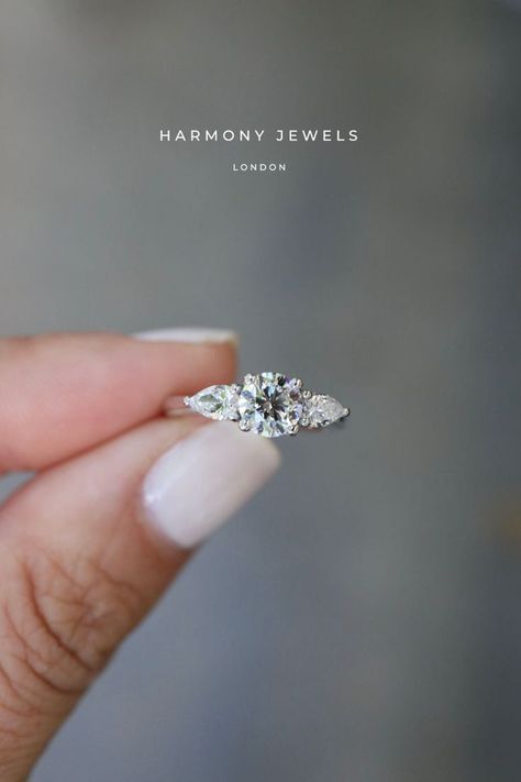 Pear Sidestone Engagement Ring, Round Diamond Side Stones, Round Diamond Engagement Rings With Side Stones, Trilogy Diamond Engagement Ring, Engagement Ring Accent Stones, 3 Stone Engagement Rings Silver, Trilogy Engagement Ring Silver, Three Stone Wedding Rings, Round Diamond With Pear Side Stones