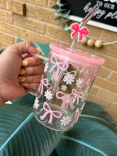 Coquette Pink bows glass mug 16oz Glass mug Straw and lid Made with UVDTF (permanent)  For cold and hot drinks  FREE STRAW CHARM!  Hand wash only Cute Cups And Mugs, Uvdtf Ideas, Vasos Aesthetic, Preppy Cups, Daisy Mug, Water Bottle Cute, Starbucks Cup Design, Trendy Water Bottles, Stocking Stuffers For Girls