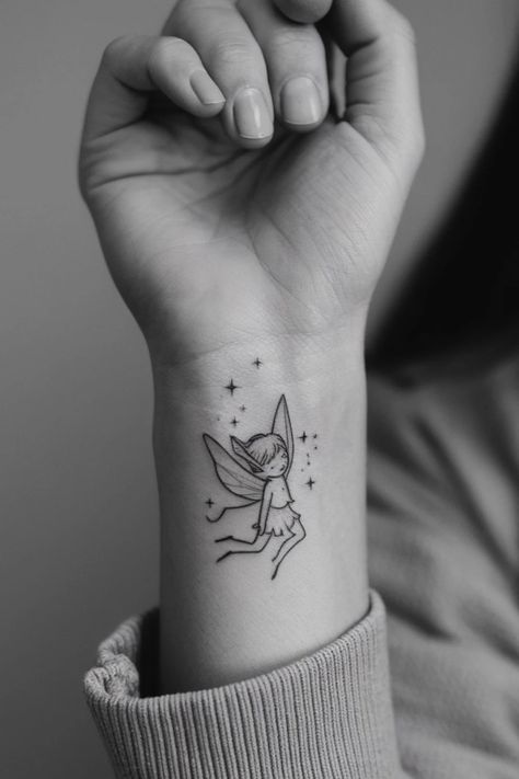 Fairy tattoo with stars on a person's wrist. Tatoos Woman Ideas Hand, Small Wrist Tattoos For Women, Women Tattoo Inspiration, Vegan Symbol, Intricate Drawings, Tattoo Ideas For Females, Small Drawing, Small Wrist Tattoos, Wrist Tattoos For Women