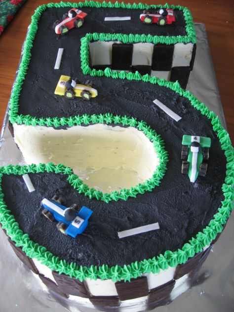 Another year has rolled around and our lovely eldest grandson turned five years old! He chose a race track birthday cake this year, and this is how it turned out. Fifth Birthday Cake, Number 5 Cake, Race Track Cake, Wheels Cake, Racing Cake, Construction Birthday Cake, Hot Wheels Cake, Race Car Cakes, Car Cakes