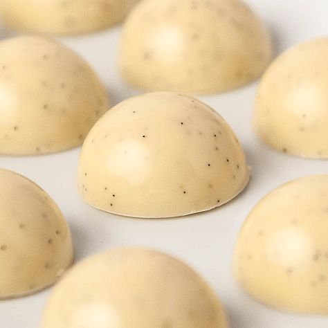 White Chocolate Bonbons With Vanilla Bean Ganache White Chocolate Bonbons, Chocolate Bon Bons Recipe, Homemade Bonbons, Bonbon Recipe, Chocolate Molds Recipe, Bonbons Recipe, Chocolate Bon Bon, Chocolate Bonbons Recipe, Vanilla Ganache