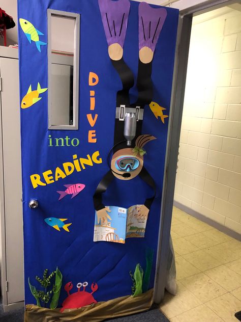 Dive into reading 2020 Dive Into Reading Display, Dive Into Reading Door Decoration, Ocean Theme Reading Corner, Scuba Diver Bulletin Board, Underwater School Theme, Reading Theme Door Decorating Ideas, Dive Into Learning Theme, Under The Sea Book Fair, Classroom Library Quotes