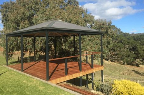 How to Build a Deck on a Slope: A Step-by-Step Guide Floating Deck On A Hill Sloped Yard, Building A Deck On A Sloped Yard, Building A Deck On A Slope, Platform Deck On Sloped Yard, Deck On Sloped Yard, Chicken Coops On A Slope, Deck On A Slope, How To Level A Backyard Slope, Ground Level Deck With Gazebo