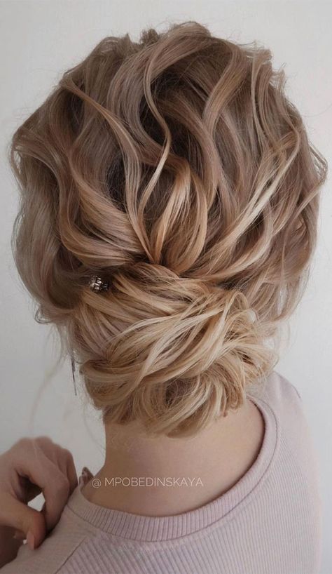 The best wedding hairstyles 2019 Low Side Bun Wedding Hair Curly, Low Messy Bun Wedding Hair Medium Length, Wavy Hair Low Bun, Bun Hairstyles For Wedding Guest, Low Curly Bun Wedding, Curly Low Bun Wedding, Low Curly Bun Hairstyles, Bridal Messy Updo, Wavy Low Bun