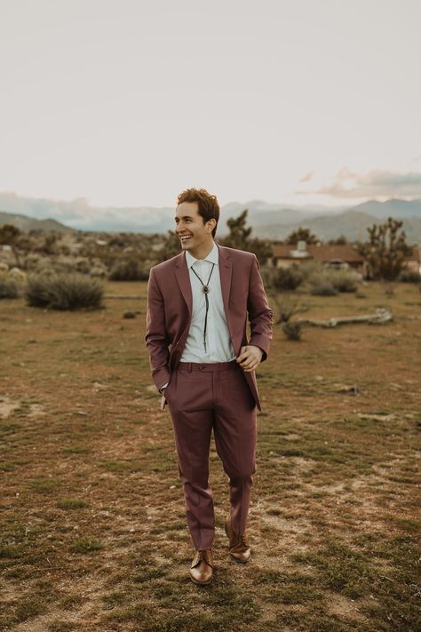 Bright + Boho Wanderlust Inpso in Joshua Tree | Desert Wedding | Modern Wedding Inspiration | Desert Wedding Inspiration | Mauve Red Southwestern Groomsmen Attire | Stylish Groom | #aandbebridalshop #ruedeseine #joshuatreewedding Groom Suit Casual Wedding, Semi Formal Rustic Wedding Guest Attire, Desert Groom Attire, Mens Boho Wedding Attire Guest, Desert Wedding Suit, Mountain Wedding Mens Attire, Desert Wedding Guest Outfit Men, Western Wedding Guest Outfit Men, Mountain Wedding Attire