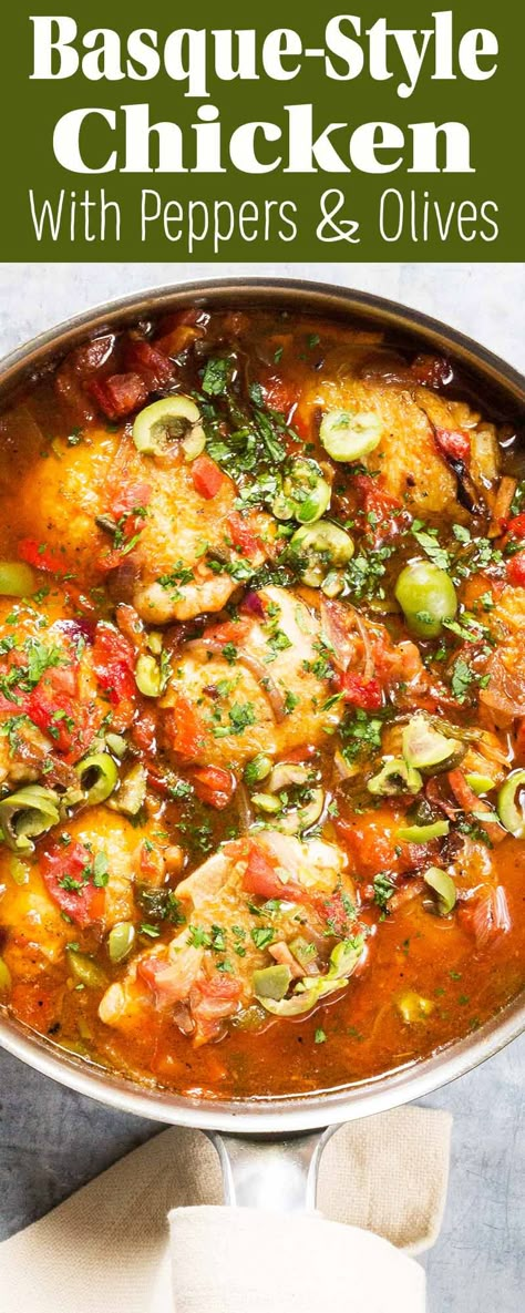 Basque-Style Chicken simmered in an easy sauce with roasted chili peppers, ham, tomatoes, garlic, and olives. Makes a warming, hearty dinner on a chilly night. #dinner #chicken Basque Chicken Recipes, Basque Chicken, Roasted Chili Peppers, Chicken With Peppers, Basque Recipes, Basque Food, Chicken Dishes Easy, Diy Easy Recipes, Best New Recipes