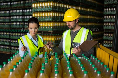 Two factory workers monitoring cold drink bottles by Wavebreakmedia. Two factory workers monitoring cold drink bottles at drinks production factory #Affiliate #monitoring, #cold, #factory, #workers Factory Photography, Infographic Design Process, Factory Worker, Food Factory, Floral Invitations Template, Texture Photography, Unique Packaging, Business Portrait, Geometric Logo