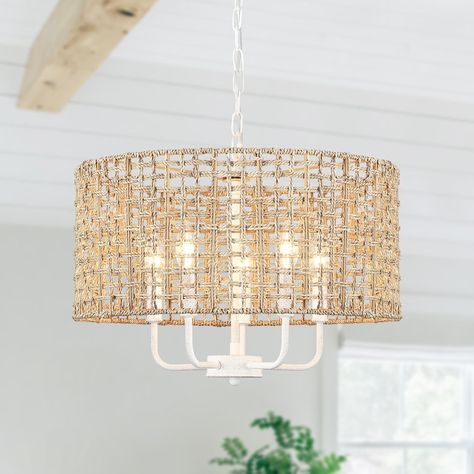 In the realm of lighting artistry, this woven rattan drum pendant light showcases unparalleled elegance through its distinctive design and meticulous craftsmanship. Coastal Farm House, Coastal Dining Rooms, Night Interior, Lake House Lighting, Beach Condo Decor, Bohemian Dining Room, Florida Kitchen, Coastal Dining Room, Florida Decor