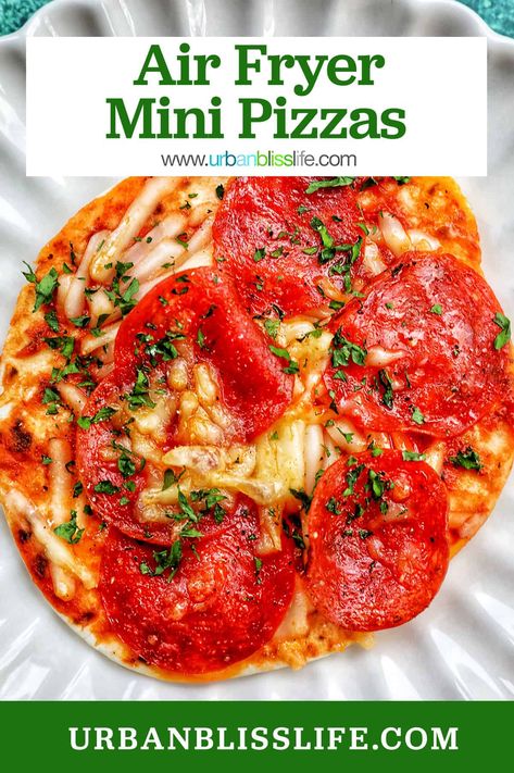 These mini air fryer pizzas are made with just four pantry staples and can be whipped up for an easy lunch, snack, or dinner in 15 minutes! Air Fryer Mini Pizzas, Pizza Air Fryer, Pizza Recipies, Mini Air Fryer, Thai Chicken Pizza, Individual Pizzas, Meat Lovers Pizza, Leftover Pizza, Easy Homemade Pizza