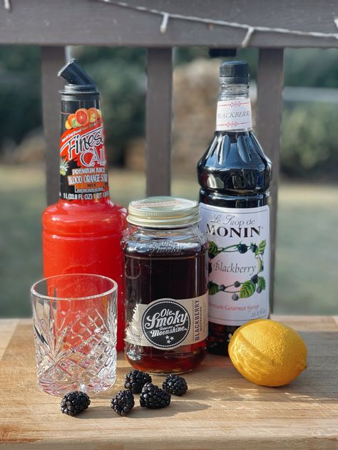 Blackberry Moonshine Cocktails, Blackberry Moonshine Recipe Cocktails, Disney Moonshine Sour Recipe, Blackberry Sour Drink, Epcot Moonshine Sour Recipe, Moonshine Martini, Moonshine Sour Disney Recipe, Moonshine Drinks, Blackberry Moonshine