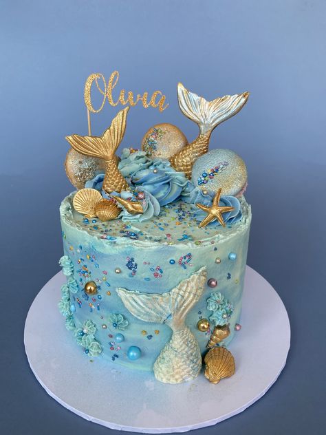 Blue and gold mermaid cake Ocean Themed Cakes Mermaid Birthday, Mermaid Cake Buttercream, Blue Mermaid Cake, Mermaid Cakes For Girls Birthday, 3 Tier Mermaid Birthday Cake, Mermaid Birthday Cake 2 Tier, One Tier Mermaid Cake, Mermaid Theme Cake Buttercream, Mermaid Themed Cake