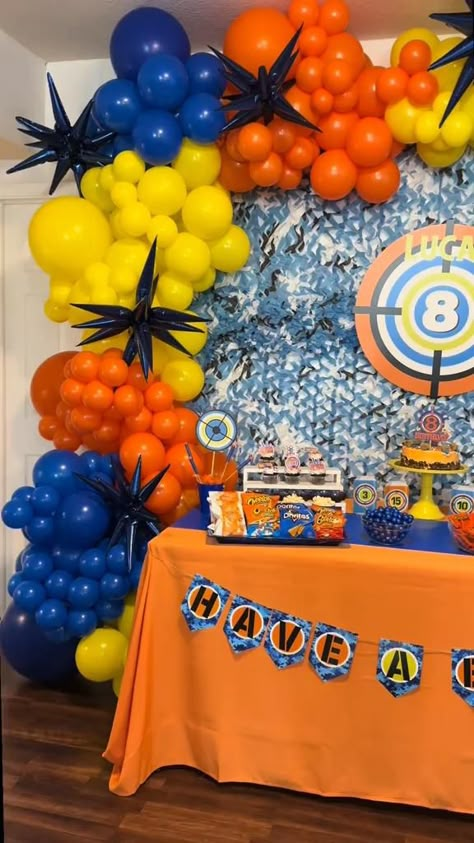 How fun is this Nerf party that @coffeeandconfettimom threw! 💙🧡💙🧡

#summerparty #partytheme #partydecor #balloongarland #nerf #nerfparty #teenbirthday #birthday #birthdayparty 6 Yo Birthday Party Ideas, 8 Yo Birthday Party Ideas, 7th Birthday Boy Theme, Glow In The Dark Nerf Party, Six Year Old Birthday Party Ideas Boy, Boys Nerf Birthday Party, 5th Boy Birthday Ideas, 7 Birthday Party Ideas Boy, Nerf Battle Birthday Party