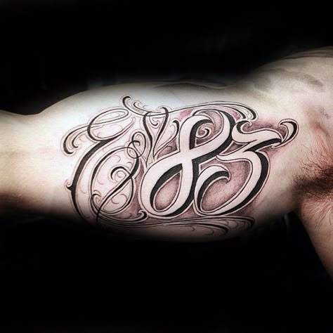 Mens Script Ornate Est 83 Inner Arm Bicep Tattoo Arm Bicep Tattoo, Script Bicep Tattoo, Bicep Writing Tattoo Men, Tattoo Inside Bicep Men, Bicep Script Tattoo Men, Inner Bicep Text Tattoo, Est Tattoos For Men, Bicep Tattoo Men Inner, Inner Bicep Men’s Tattoo