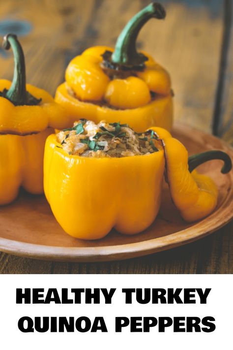 Healthy turkey quinoa stuffed yellow bell peppers on a wooden plate. Stuffed Peppers Quinoa, Healthy Stuffed Peppers, Quinoa Stuffed Bell Peppers, Butter Mayo, Stuffed Bell Peppers Recipe, Turkey Quinoa, Fluffy Quinoa, Turkey Mince Recipes, Quinoa Stuffed Peppers