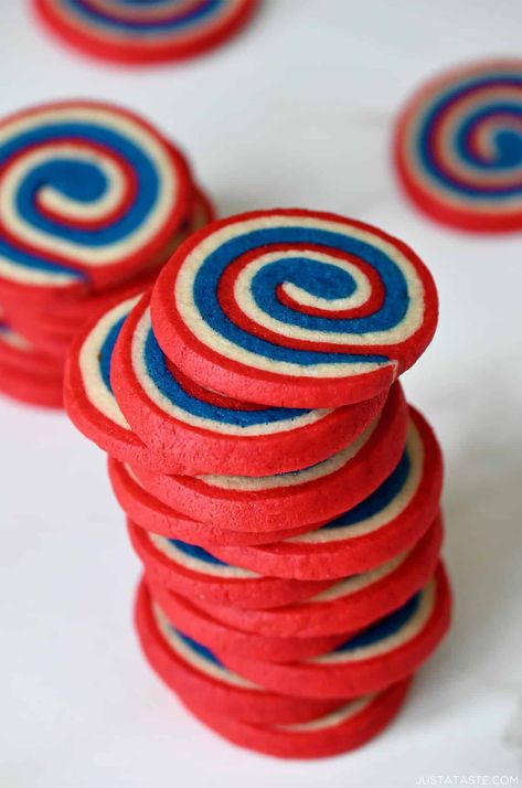 Red, White and Blue Pinwheel Icebox Cookies are the ultimate patriotic dessert! They’re soft, chewy and made with basic pantry ingredients. Add this easy cookie recipe to your 4th of July desserts menu! justataste.com #redwhiteandbluedesserts #4thofjulydesserts #4thofjulycookies #patrioticdesserts #4thofjulyfood #cookies #justatasterecipes Easy Sugar Cookie Dough, Pinwheel Sugar Cookies, Pinwheel Cookies Recipe, 4th Of July Cookies, Memorial Day Desserts, Patriotic Cookies, Icebox Cookies, Fruit Pizza Sugar Cookie, Cookies Holiday