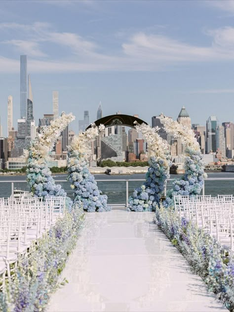 Blue Outdoor Wedding Decor, Ceremony Wedding Decor Outdoor, Blue Sky Wedding Theme, Wedding Decorations Ceremony Outdoor, Flower Path Wedding, White Blue Wedding Decoration, Blue Decor Wedding, Blue White Wedding Decor, White And Blue Wedding Decor