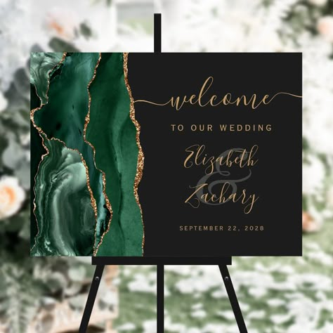 This elegant modern wedding welcome sign features an emerald green watercolor agate design trimmed with faux gold glitter. Easily customize the gold colored text on a slate black background, with the names of the bride and groom in whimsical handwriting calligraphy over a large, charcoal gray ampersand. Deep Purple Wedding, Modern Wedding Welcome Sign, Navy Blue And Gold Wedding, Green Gold Weddings, Dark Green Wedding, Olive Green Weddings, Blue Gold Wedding, Handwriting Calligraphy, Elegant Modern Wedding