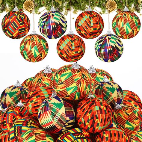 PRICES MAY VARY. African Print Design: our African Christmas ball ornaments: items feature representative traditional African print fabric patterns that are incredibly classic and attractive; The colors are bright, adding ideal and charming elements to your Christmas tree, breaking away from monotony Quality and Durability: our Kente Christmas ball ornaments are meticulously crafted, synonymous with; They are beautifully handmade, excellently made, and highly durable; Their sturdy, shatter resis Kwanzaa Tree Decorations, African Inspired Christmas Tree, African Christmas Decor, Fabric Covered Ornaments, Black Christmas Tree Ornaments, African Christmas Tree, African Christmas Decorations, African Ornaments, Xmas Bulbs