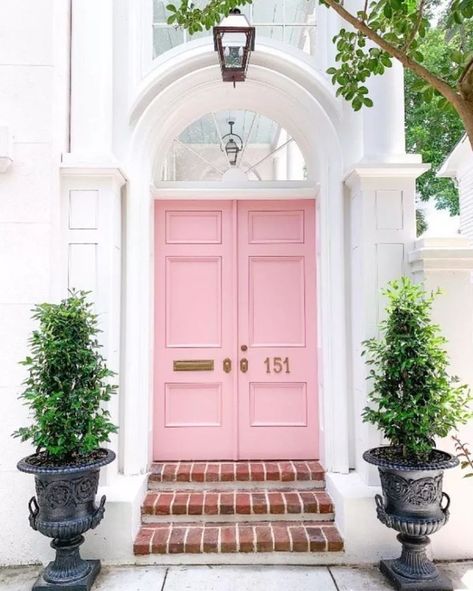 Make your front door stand out each season with a fresh coat of paint. We're loving this front door paint color called "Nancy's Blushes" by Farrow & Ball. We've got more front door paint color ideas for you in this post. Bright Front Doors, Best Front Door Colors, Pink Front Door, Best Front Doors, Front Door Paint Colors, Door Paint Colors, Charleston Homes, Pink Door, Painted Front Doors