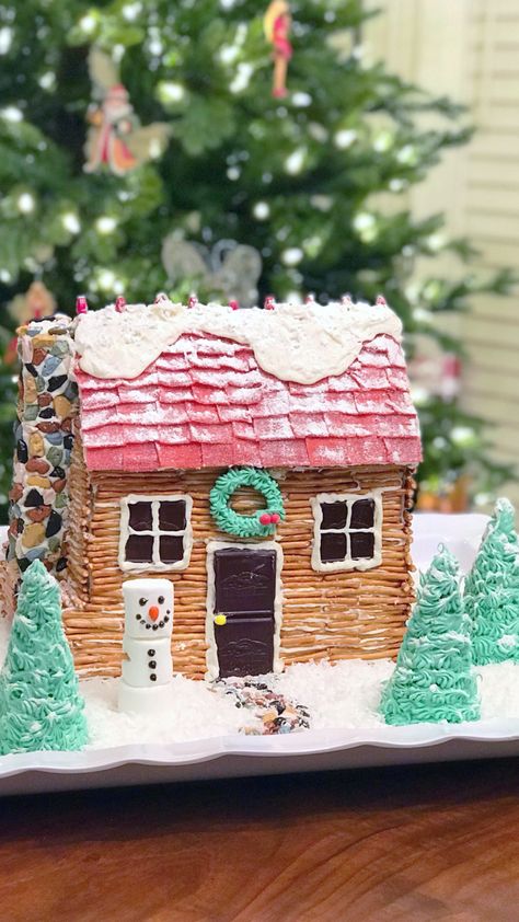 Adorable log cabin gingerbread house built by my mom and I Christmas 2017 Gingerbread House Competition Winners, Pretzel House Log Cabins, Log Cabin Gingerbread House Ideas, Gingerbread House Log Cabin, Log Cabin Gingerbread House, Cabin Gingerbread House, Stick House, Homemade Gingerbread House, Gingerbread House Ideas