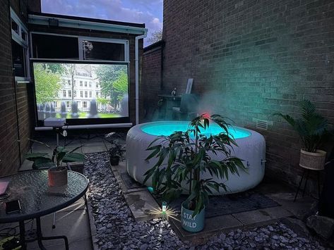 Why not create your very own hot tub cinema? All you need is a Lay-Z-Spa, a projector and a white wall or projector. Indoor Inflatable Hot Tub Room Ideas, Balcony Projector Ideas, Balcony Projector, Patio Projector Ideas, Inflatable Hot Tub Patio, Hot Tub In Garage Ideas, Hot Tub Room Ideas Indoor, Projector Setup Ideas, Garden Projector