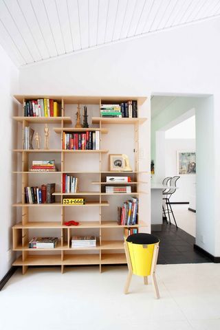 We love our loft apartment, but it only has one closet. So we have to get creative with clothing and book storage. A large shelf was a good solution for stacking... Adjustable Bookshelf, Tall Shelves, Plywood Shelves, Large Shelves, Small Shelves, Plywood Furniture, Bookcase Shelves, Design Del Prodotto, Design Living Room