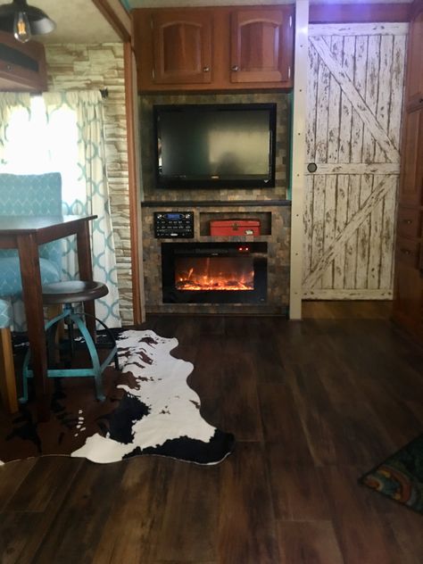 Rv Fireplace Makeover, Rv Fireplace Remodel, Camper Fireplace Ideas, Camper Fireplace, Electric Fireplace Ideas For Rv, Rv Fireplace, Rv Fireplace Insert, Electric Fireplace In Camper, Converted Cargo Trailer