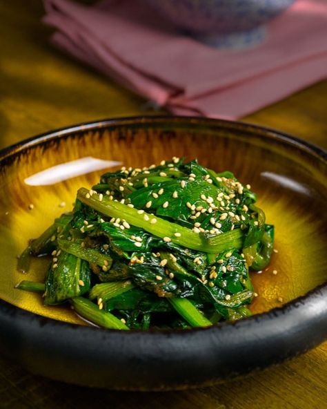 Korean Spinach Salad 🥬🇰🇷 This salad is a refreshing and tasty way to incorporate more greens into your diet. It’s packed with nutrients and has a perfect balance of flavors and textures. The spinach is lightly dressed with a simple mixture of toasted sesame oil and soy sauce, then topped with crunchy sesame seeds and sliced scallions. Optional chili flakes add a touch of heat, making this salad a perfect side dish for any Korean meal. It’s easy to make and only requires a few simple ingredie... Korean Spinach, Toasted Sesame Oil, Spinach Salad, Chili Flakes, Perfect Side Dish, Sesame Oil, Sesame Seeds, Soy Sauce, Side Dish