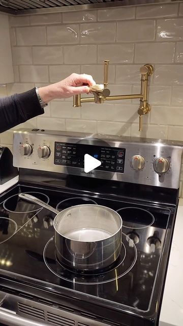 Lisa Sandham Interior Design on Instagram: "Sneak peak alert! Can you guess what’s cooking in this newly renovated kitchen? 🍝 Stay tuned for the big reveal!   Pot filler @faucetorsink   🎥 @dangarritymediacommercial   #kitchendesign #pasta #kitchenmusthaves #kitchenrenovation #homerenovation #interiordesign" Por Filler Kitchen, Pot Fillers Over Stove Placement, Pot Filler Placement, Pot Fillers Over Stove, Kitchen Facelift, Pot Filler Kitchen, Stove Backsplash, Renovated Kitchen, Hidden Kitchen