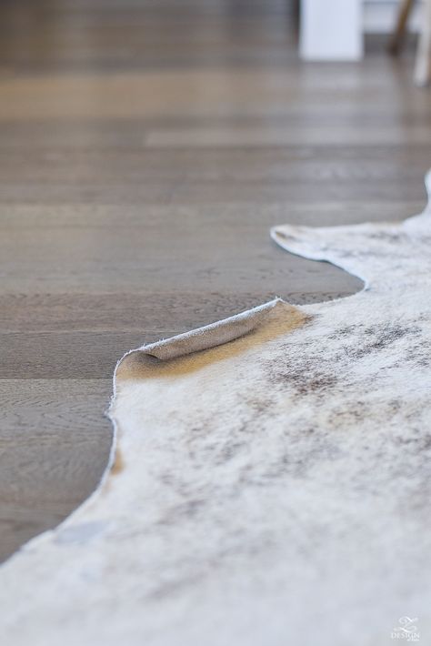 ZDesign At Home: How to Get the Curl out of a Cowhide Rug Cowhide Rug Under Dining Table, Cowhide Under Dining Table, Cowhide Rug In Bathroom, Living Room With Cowhide Rug, How To Style A Cowhide Rug, Hide Rugs, Fawn Rug Living Rooms, Stacked Cowhide Rug, Cowhide In Kitchen