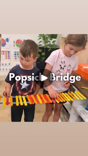 1.6K views · 20K reactions | POPSICLE BRIDGE 🌁🎉✨  This activity took 2 minutes to set up and kept my kiddos busy for wayyyyy longer than I expected. 🙌🎉  I just found a place to put 2 strips of painters tape sticky side up (like a bridge) and then gave my kids some Popsicle sticks!   I told them to try and build a bridge strong enough to drive their toy cars on it! I was amazed by how well they worked together and figured it out!   They liked this activity so much they asked to do it 3 separate times in one day! 😅🙌🎉  We will be repeating this one for sure!   Want more easy activity ideas like this? Follow @wingitwithwhit for Mom Hack Mondays, daily activities for kids, and FREE printables every Friday on stories every Friday!   Activity for Kids | STEM Activity | At Home Activity | L Bridge Activities For Kids, Popsicle Activities For Kids, Friday Activities For Kids, Popsicle Stick Activities, School Age Activities Daycare, Popsicle Bridge, Bridge Craft, Daily Activities For Kids, Popsicle Stick Bridge