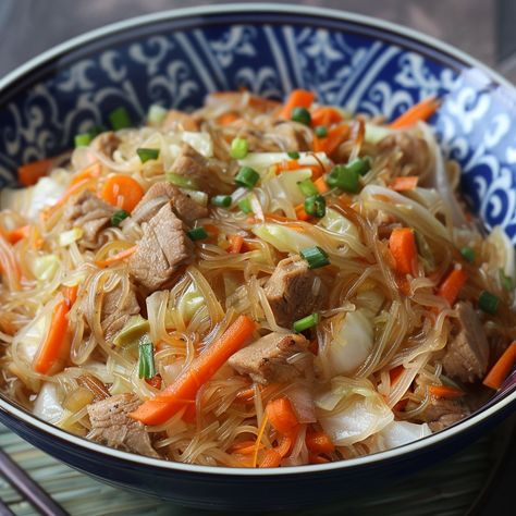 🍜 Dive into the delicious world of Bihon Guisado! Perfect for any meal! #NoodleDelight Bihon Guisado Ingredients: Rice noodles (8 oz (227g)) Pork, thinly sliced (1/2 cup (115g)) Carrots, julienned (1/2 cup (65g)) Cabbage, shredded (1 cup (90g)) Soy sauce (2 tbsp (30ml)) Chicken broth (1 cup (240ml)) Garlic, minced (1 clove) Instructions: Soak noodles in warm water until soft. Sauté garlic, pork, and veggies. Add noodles, soy sauce, and broth. Cook until liquid absorbs. 🌟 Transform your di... Bihon Guisado, Bihon Recipe, Noodles Soy Sauce, Pork And Veggies, Korean Egg, Garlic Pork, Rolled Sandwiches, Yummy Pasta, Instagram Recipes