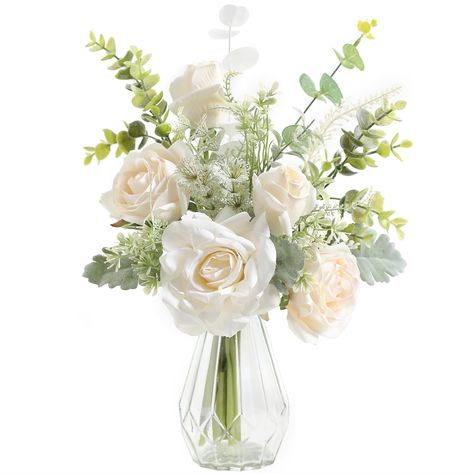 PRICES MAY VARY. Artificial Flowers in Vase:Flower arrangement with vase include white roses, artificial eucalyptus, flowers Flocked Lambs Ear, fake plants and matching one grass vase. Please put fake flowers bouquet in it when you get the product. Material: The white artificial flower is made of high quality silk and plastics,Flower arrangements artificial in vase can be bent or cut, the perfect combination of bouquets and vases, which is very suitable for rustic home decor, Christmas table cen Dining Table Flower Vase, Mediterranean Flowers Arrangements, White Roses Vase, Eucalyptus In Vase, Living Room And Dining Table, Plant Eucalyptus, White Flower Centerpieces, Flowers With Vase, Fake Flowers Decor