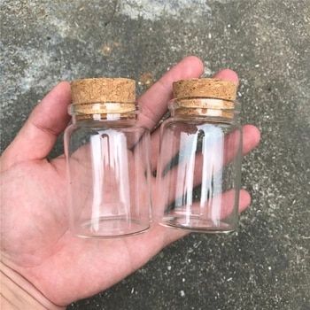 Favour Jars, Cork Jewelry, Small Glass Jars, Small Glass Bottles, Empty Jar, Wedding Gift Wrapping, Glass Bottles With Corks, Glass Spice Jars, Wedding Bottles