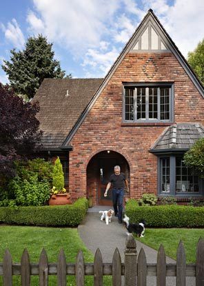 In the 1920s and '30s, speculative brick English-style houses filled a number of Seattle neighborhoods. Modern Brick Bungalow, Tudor Revival Cottage, Best Shingle Colors For Red Brick, Brick A Frame House, 1920s Brick House, Historic Brick Homes Exterior, Tudor Revival House Exterior, Red Brick Tudor, Orange Brick Houses