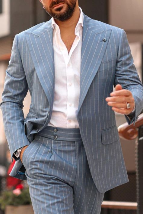 Man wearing a grey pinstripe suit! Modern Pinstripe Suit Men, Informal Suits For Men, Casual Suits Men Modern Man, Sleek Suit Men, Modern Suit Men, Wide Lapel Suit Men, Stripe Suits For Men, Striped Suits Men, Pin Stripe Suit