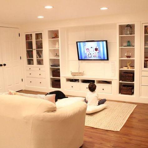 This IKEA furniture idea will give you so much more storage—and it’s been pinned 78 THOUSAND times on Pinterest!- This might be the coolest thing you'll see all day! When renovating my basement I knew I wanted a wall of built ins. Wall Of Built Ins, Ikea Hemnes Cabinet, Basement Built Ins, Basement Furniture, Wall Storage Unit, Ikea Bookshelves, Diy Basement, Basement Storage, Ikea Hemnes